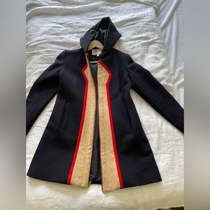 Navy wool Lauren Moffatt coat. Unique and flattering A frame design.